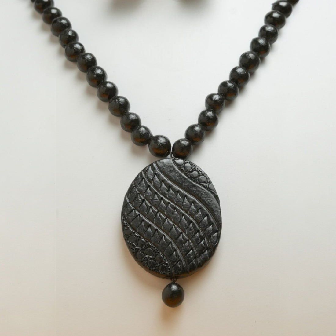 Black Terracotta Necklace with Textured Oval Pendant