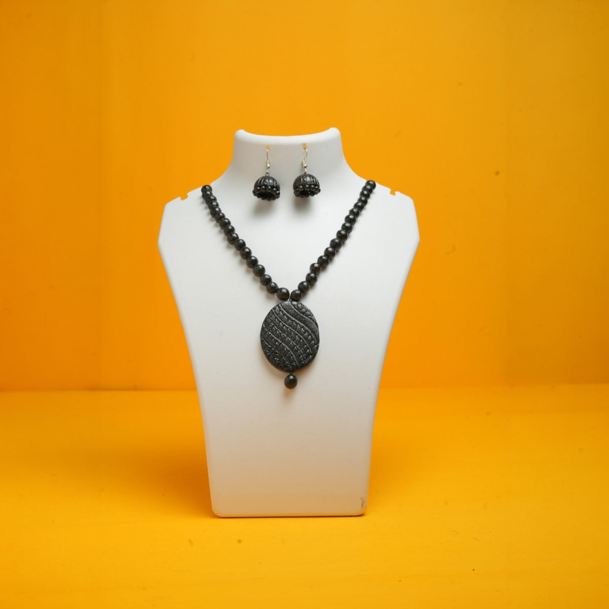 Black Terracotta Necklace with Textured Oval Pendant – view 4